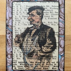 Friendly Grocer in Apron on Antique Book Page 3 x 5" Folkart #CSL20